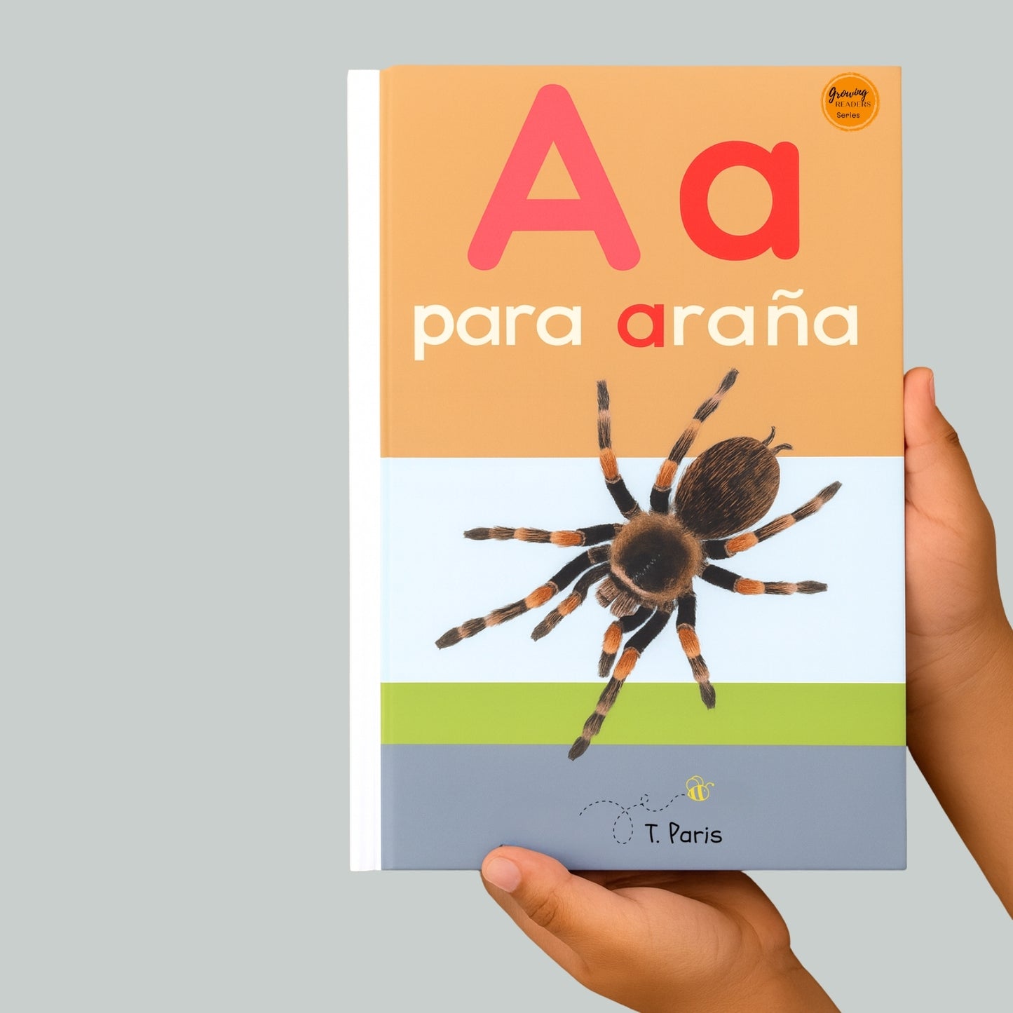 Book titled 'A para ará' with a spider illustration on a gray background