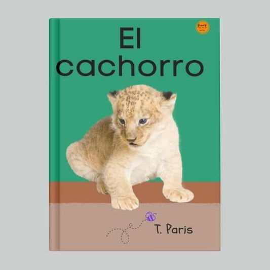 Book cover of 'El cachorro' with a lion cub on a green background