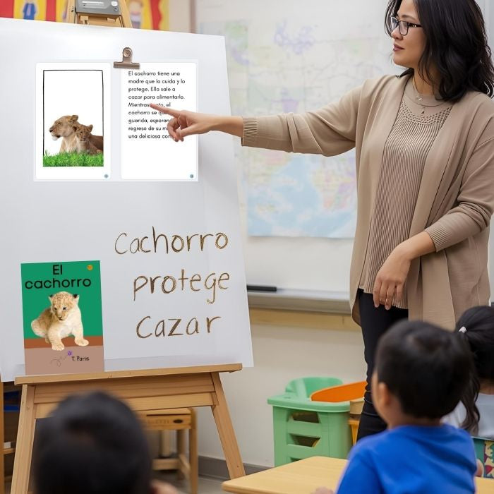 Teacher pointing at a whiteboard with children in a classroom setting