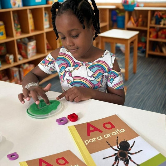 Child playing with educational materials in a classroom setting