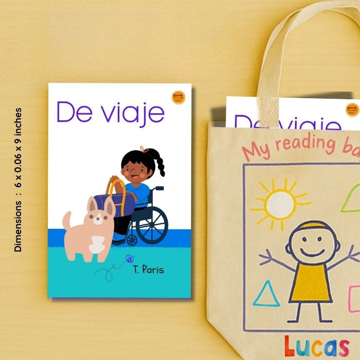 Children's book titled 'De viaje' with a tote bag featuring a child and sun design on a yellow background.