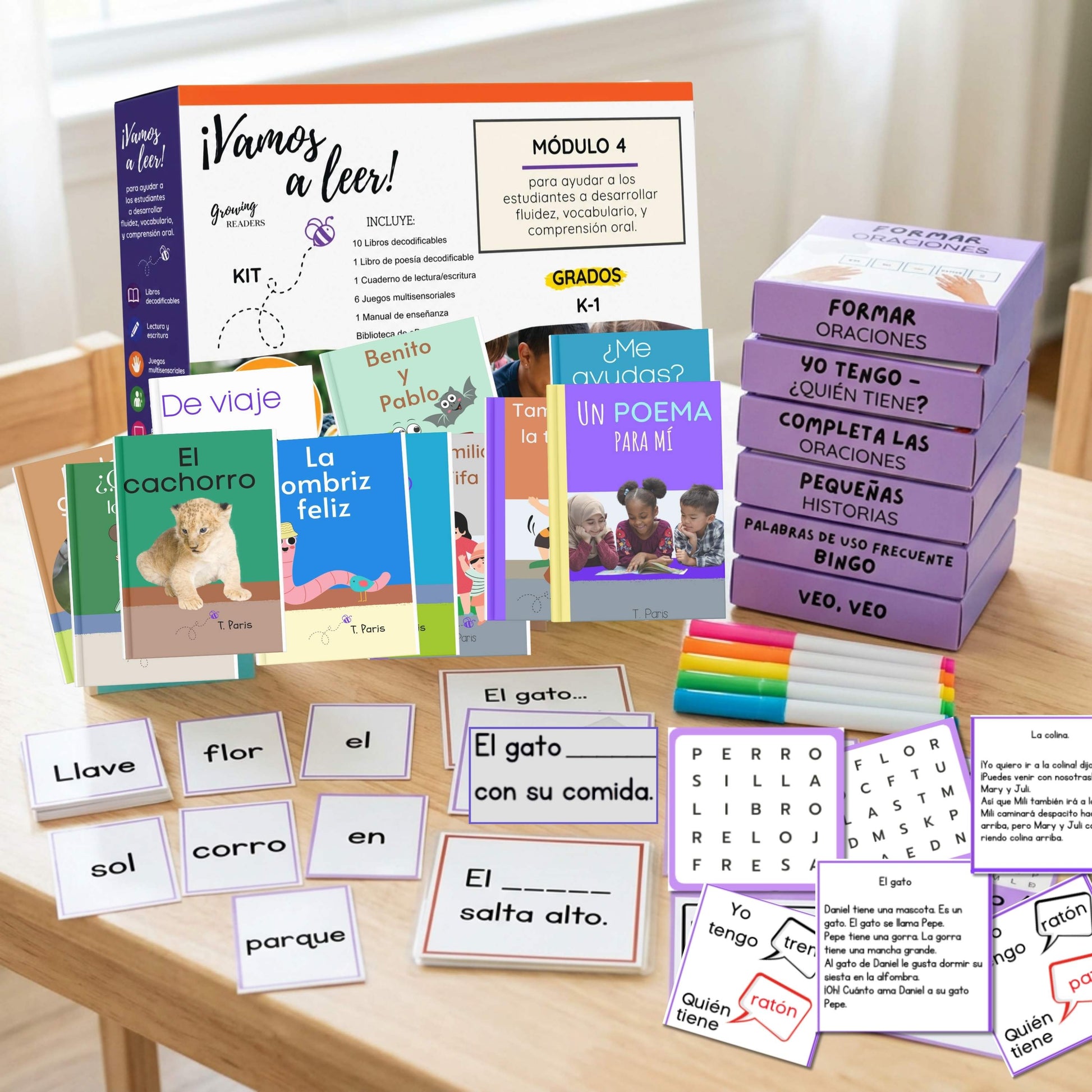 Educational materials including books, flashcards, and teaching aids on a wooden table.
